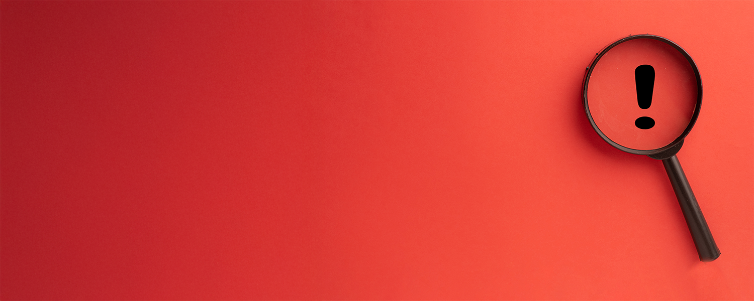 スマートフォン画面への警告マーク表示写真