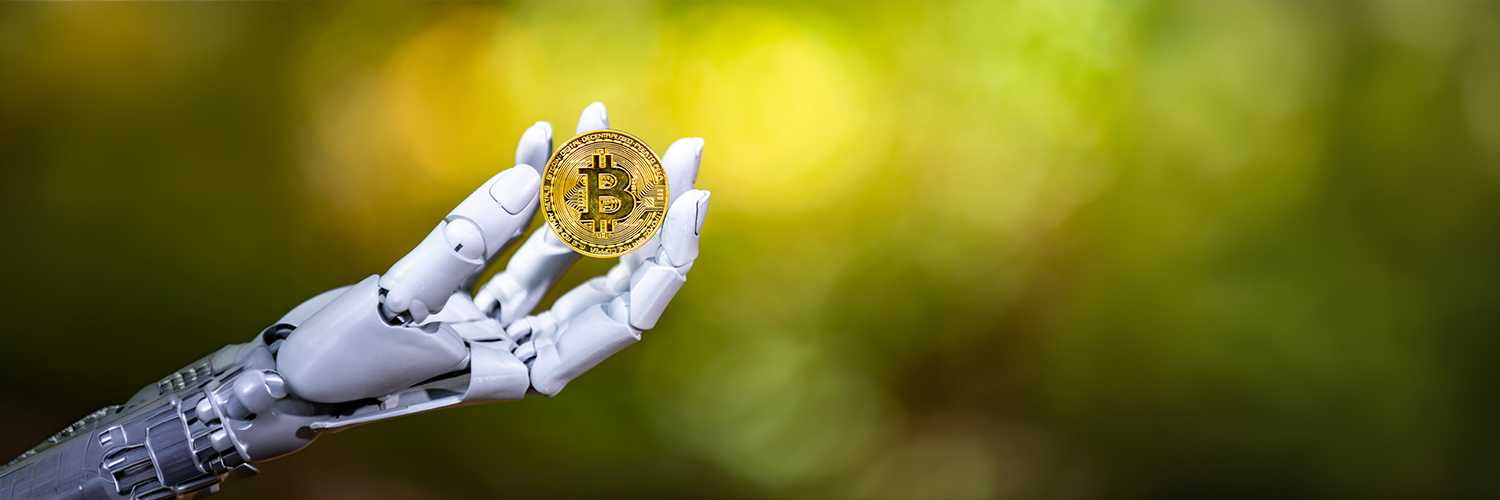 ロボットの手にビットコイン